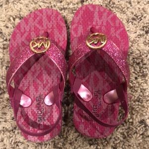 Michael Kors Fuchia Pink flip flops with backs